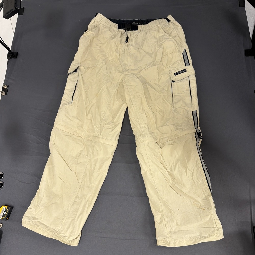 cream No Boundaries outdoor pants feature a built-in black webbed belt Large